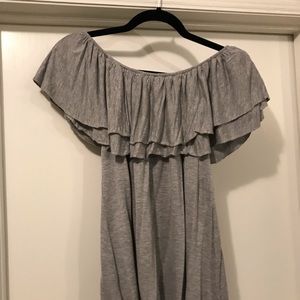 Adorable off the shoulder grey top.